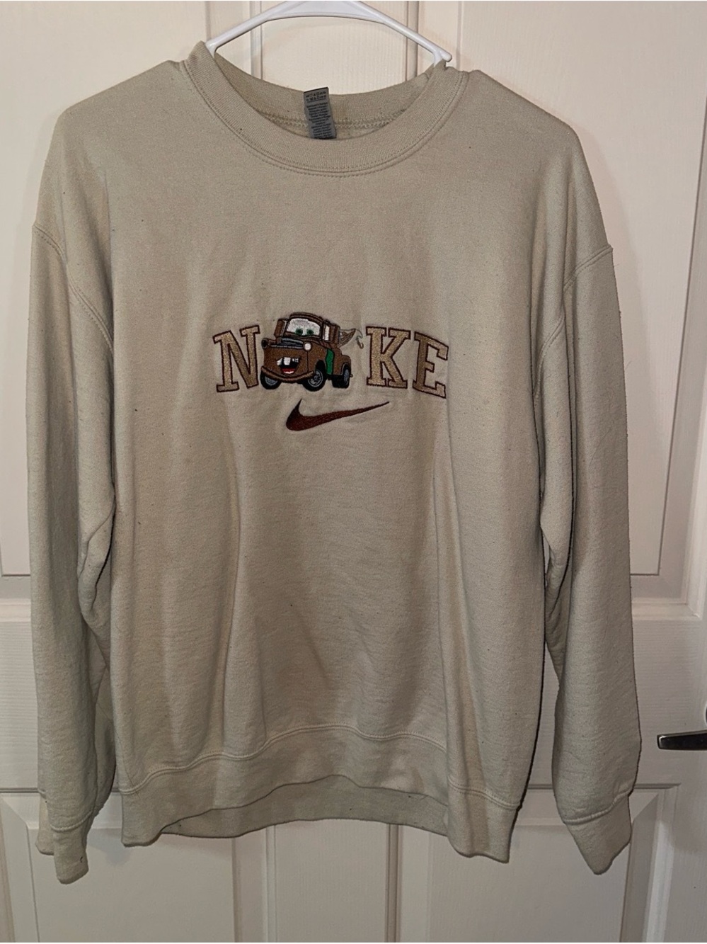 Gildan Cream Crewneck Sweatshirt with Embroidered Car and Swoosh